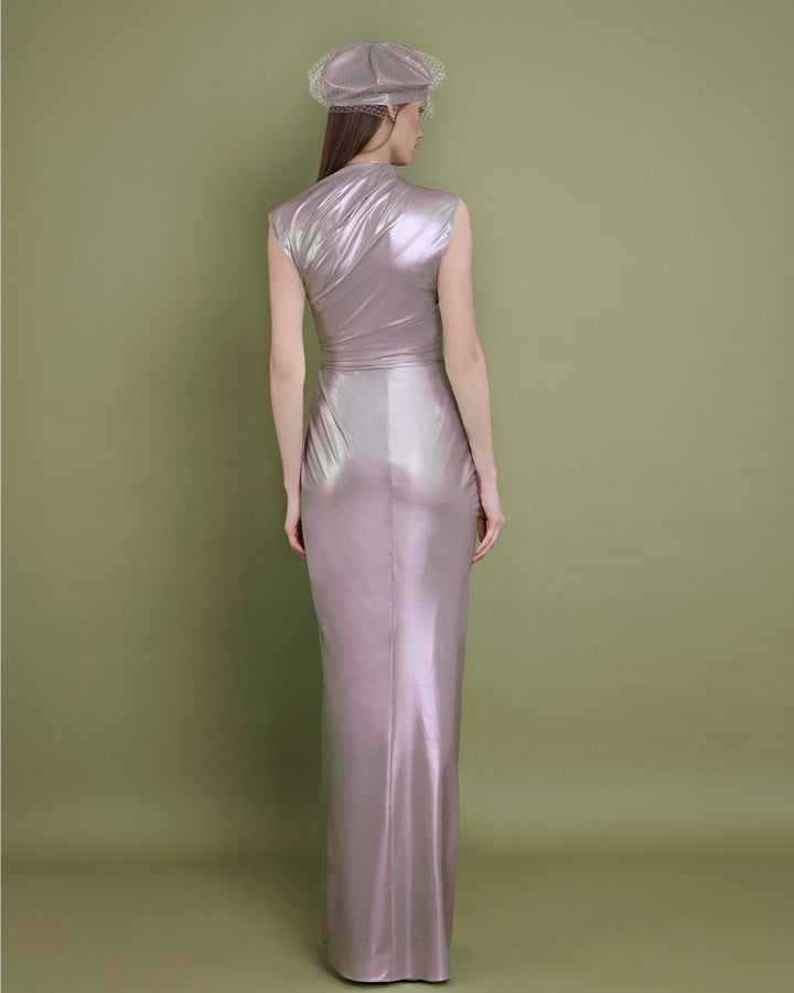 The back of an asymmetrical neckline evening dress in metallic pink latex fabric, with draping details on the waist.