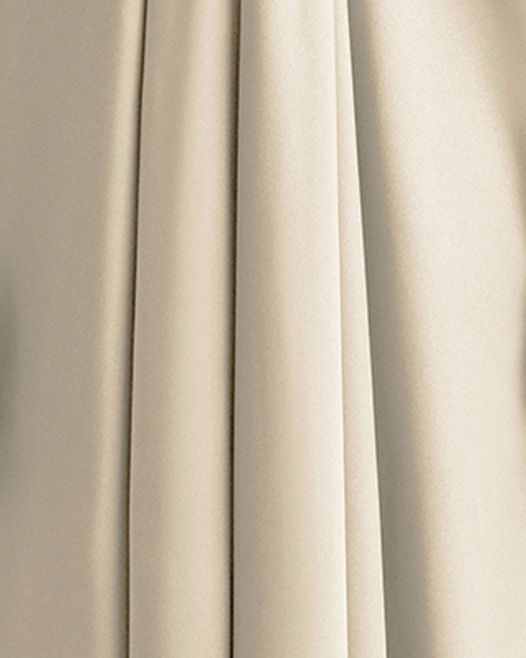 A close-up of a cream satin fabric.