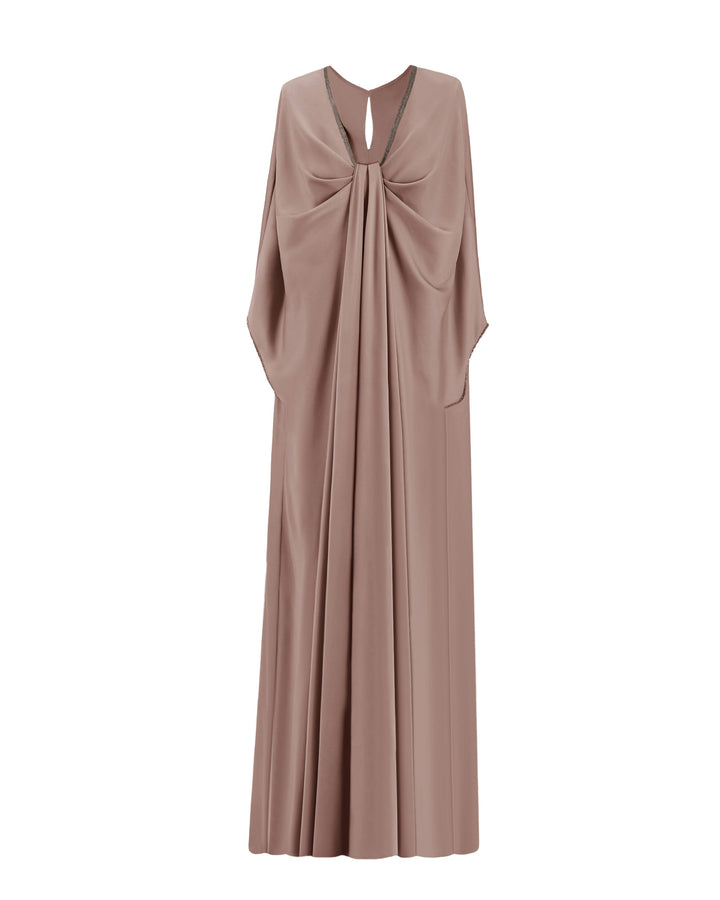 A kaftan-style evening dress in taupe color with a draped beaded neckline, featuring three-quarters sleeves.