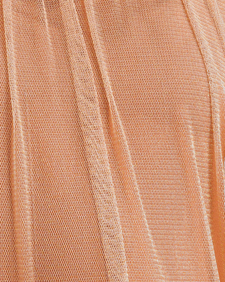 A close-up of a copper tulle fabric.