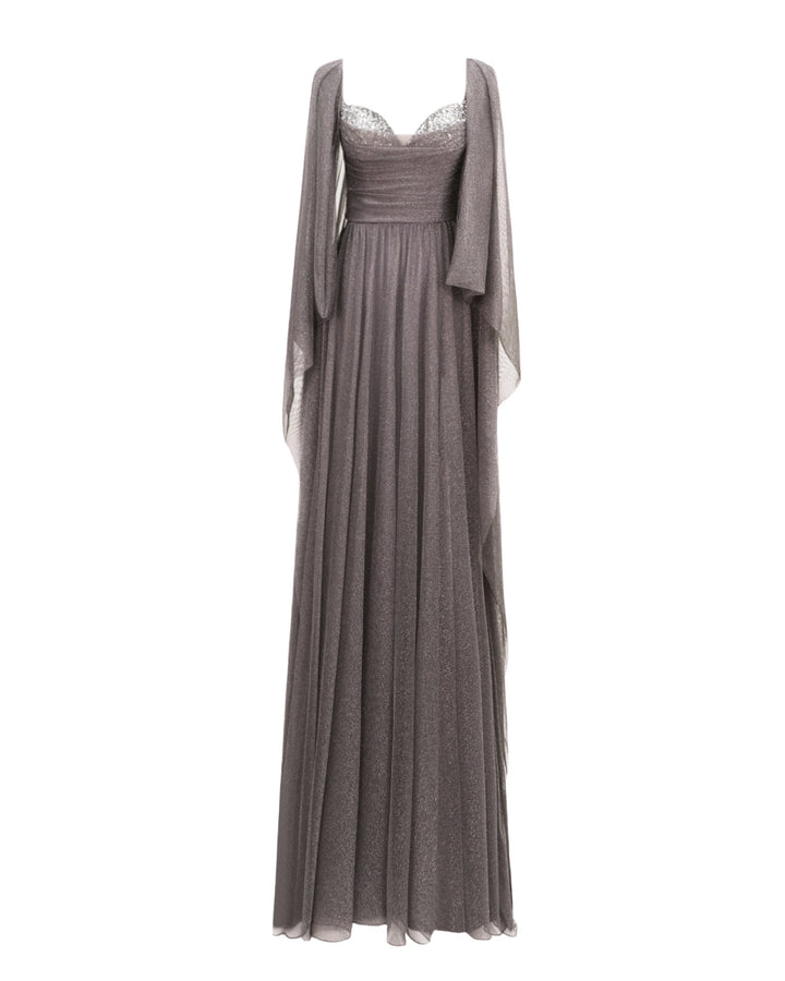 A beaded heart-neckline grey tulle evening dress with ruffled floor-length sleeves and a draped waistline.