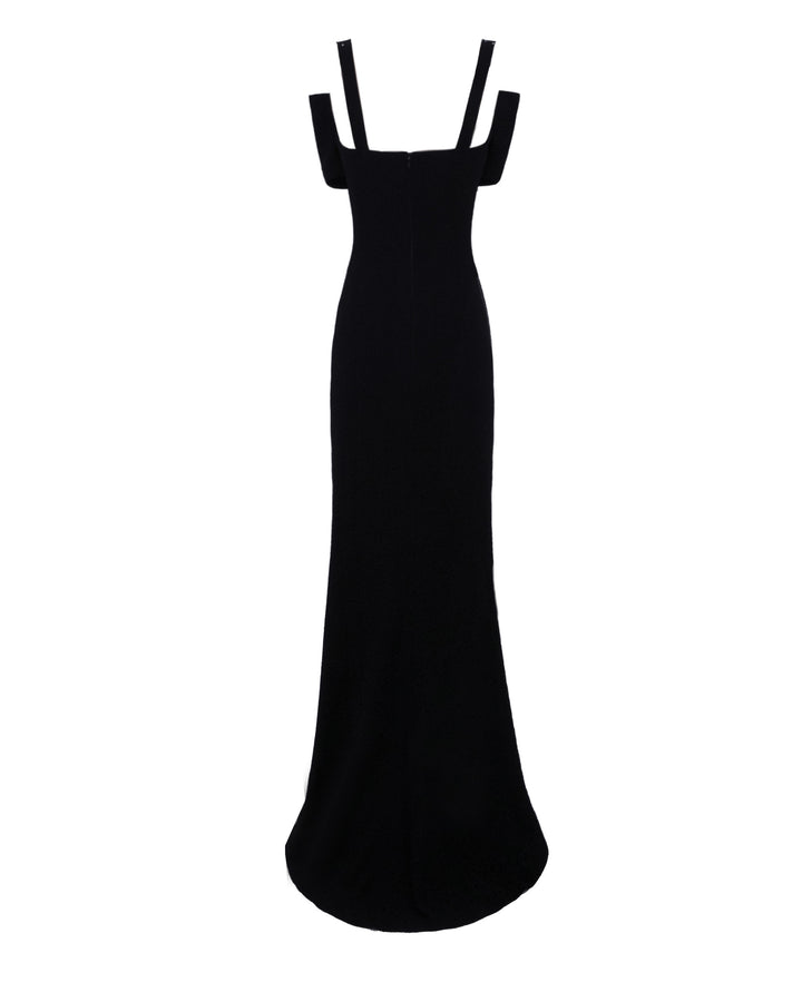 The back of a slim-cut black long evening dress.