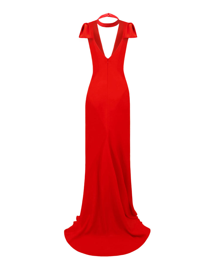 The back of a slim-cut long red evening dress featuring bows on the shoulders and an open back.