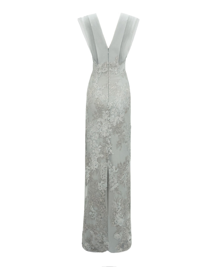 The back of a fully embellished V-shaped open back grey evening dress with a middle slit.