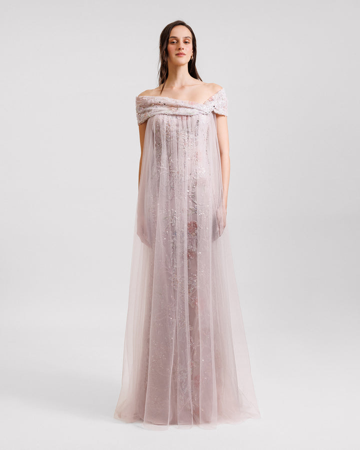 An off-the-shoulders beaded embroidery dress in dusty pink with a loose tulle overlay.