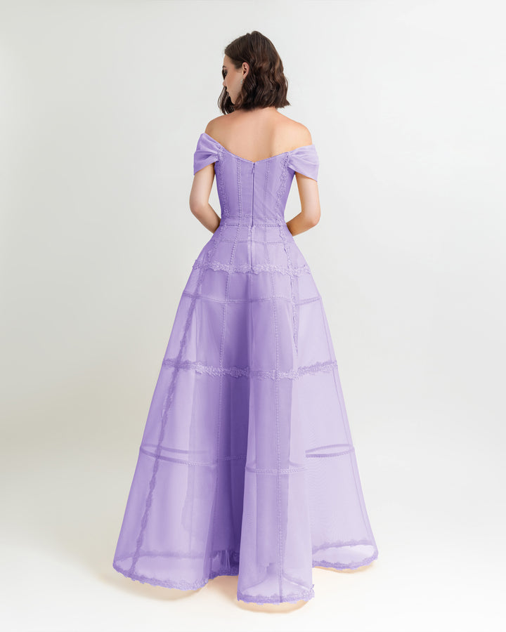 The back of an off-shoulders corset wide mesh long lilac dress.