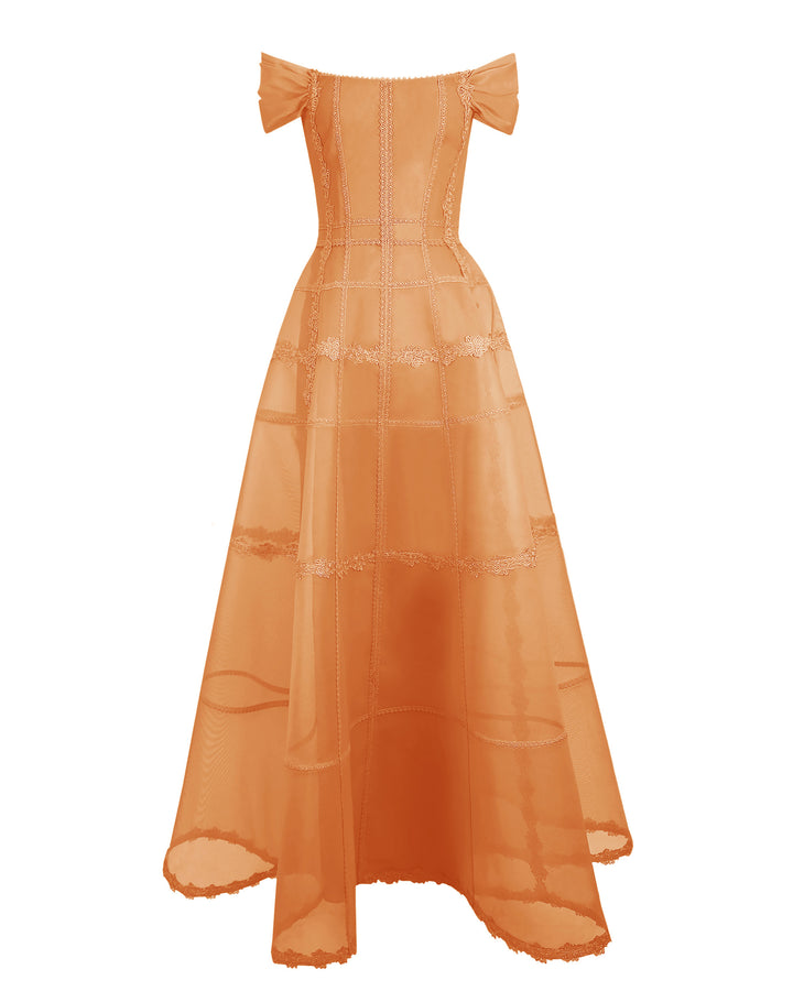 An off-shoulders corset mesh dress in orange with a long wide skirt.