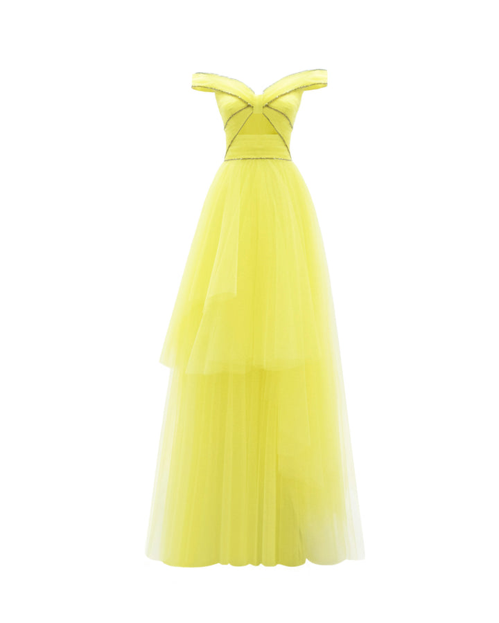 An off-the-shoulders evening yellow dress with beaded trimmings on the corset, a cut-out at the front, and an asymmetrical layered tulle skirt.