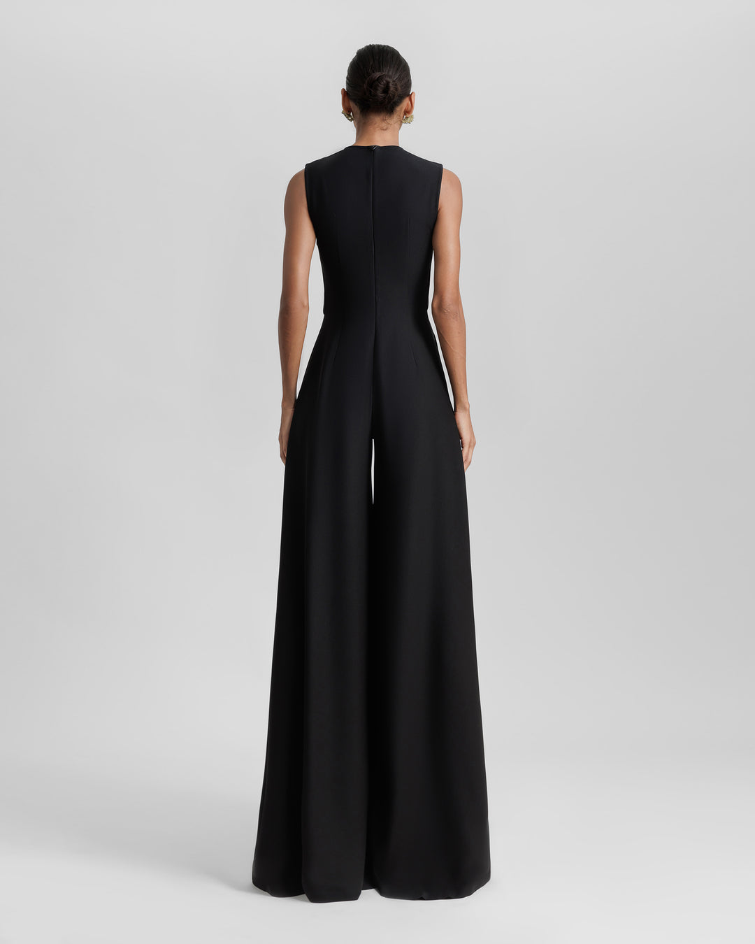 The back of a black jumpsuit.