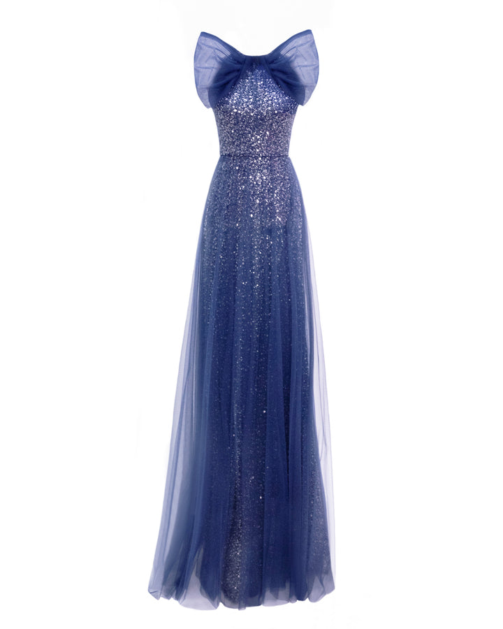 An halter-neck blue dress with a bow design and a beaded underlayer.