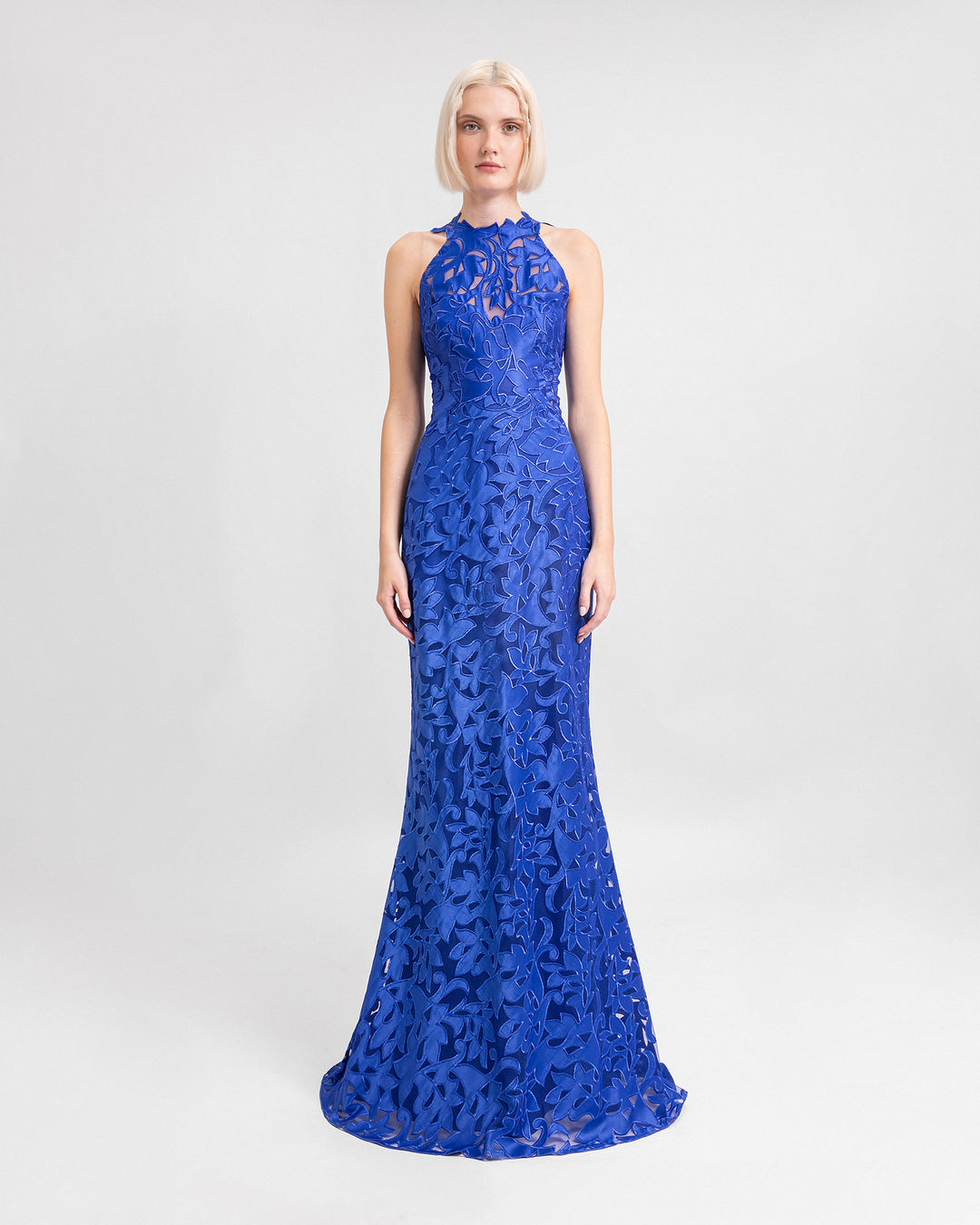 A Halter-neckline embroidered satin blue evening dress.