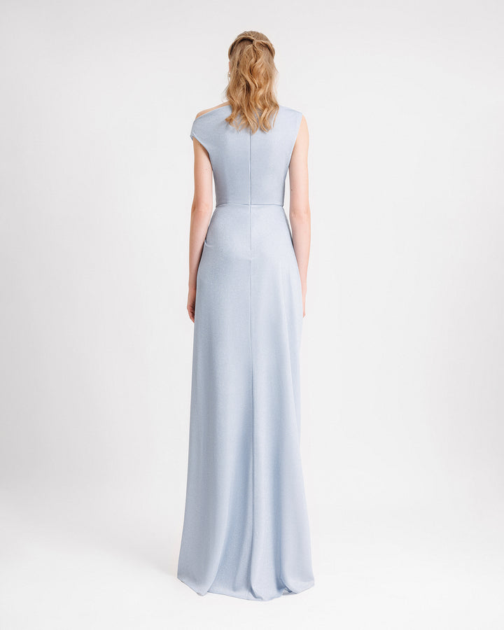 The back of a light blue evening dress featuring an asymmetrical neckline.