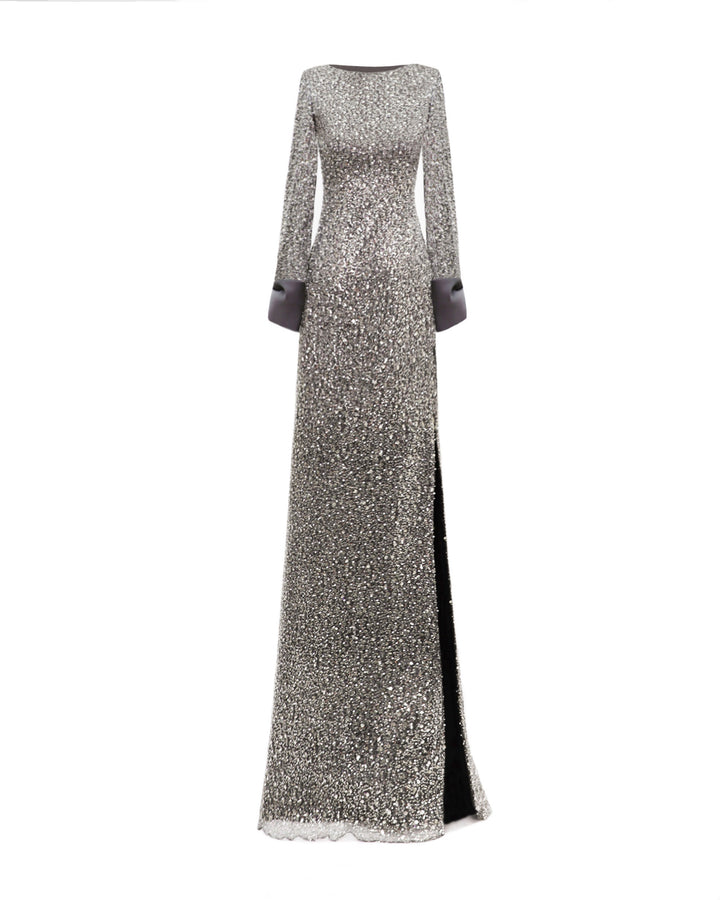 A slim-cut smokey grey evening dress with a side slit, and satin bows on the wrists.