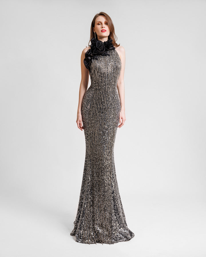 A slim-cut embroidered sequins dress with floral draping on the bodice.