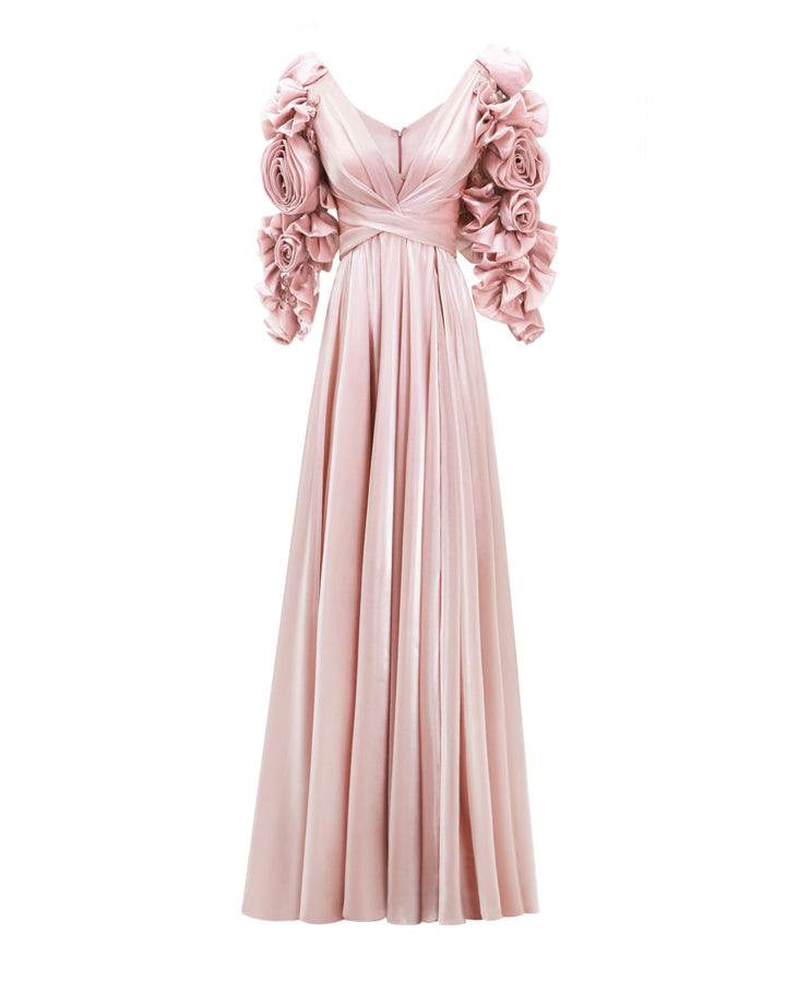 A deep V-neckline flared cut evening dress in pink color featuring draping on the waist and full floral sleeves.