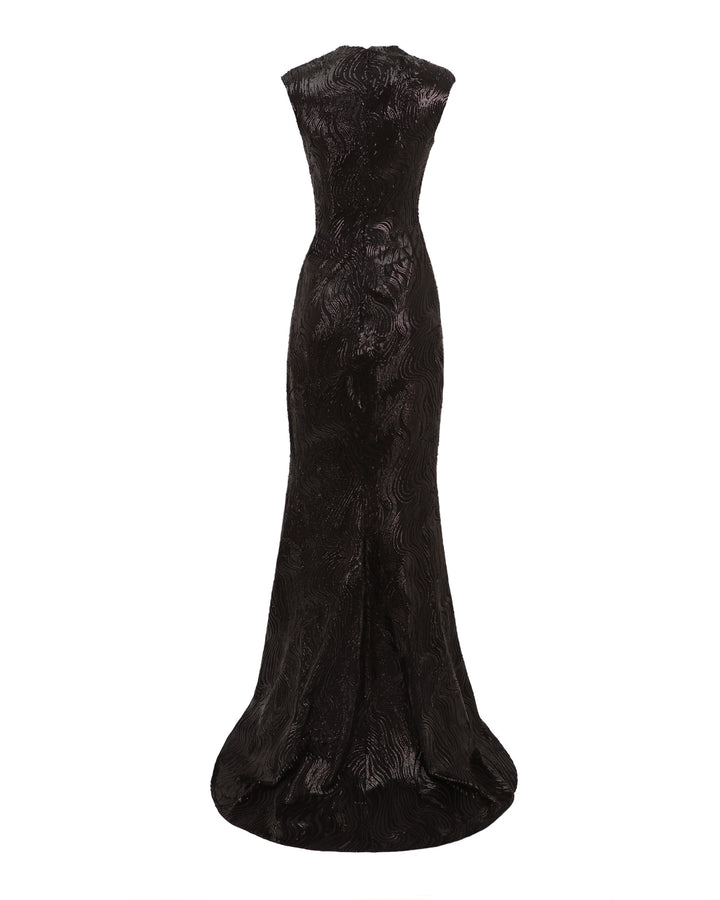 The back off a slim-cut fully sequined black evening dress.