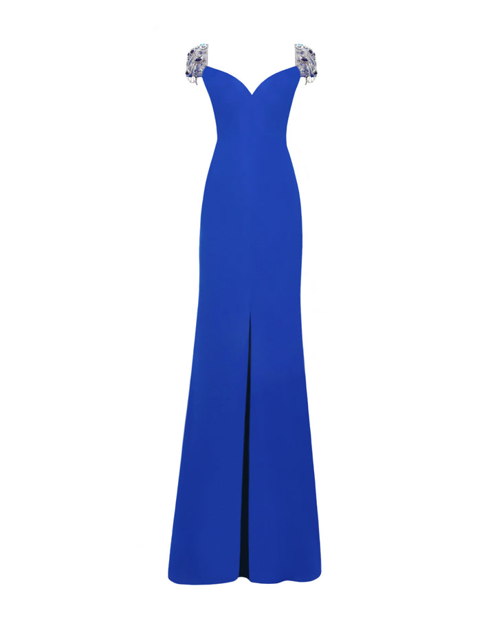 A sweetheart neckline slim-cut blue evening dress, featuring short full beaded see-through sleeves and a full open back with see-through tulle beadings and chains. This dress also has a high middle slit in the front.