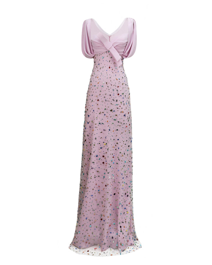 A puffed-shoulders, draped cropped top paired with a beaded Long skirt forming an amazing long multicolor beaded pink dress.