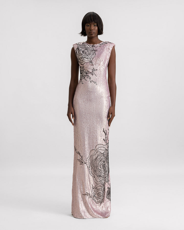 A slim-cut embroidered sequins evening dress with structured shoulders and black floral embroideries.