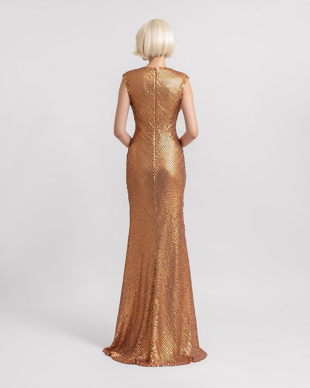 The back of a cowl-neckline full sequins slim-cut copper dress.