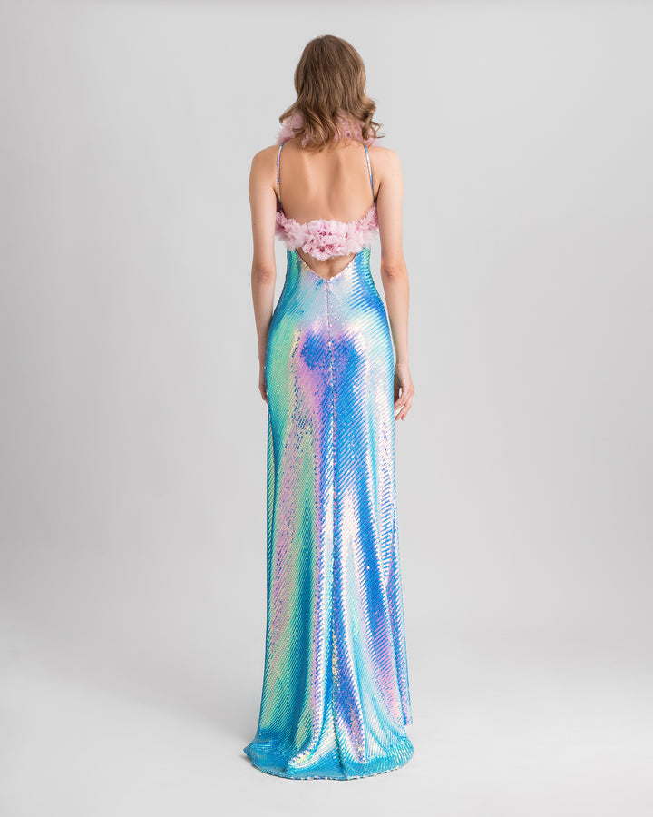 A low open back halter-neck slim-cut sequined blue evening dress, paired with a pink rushed tulle bolero.