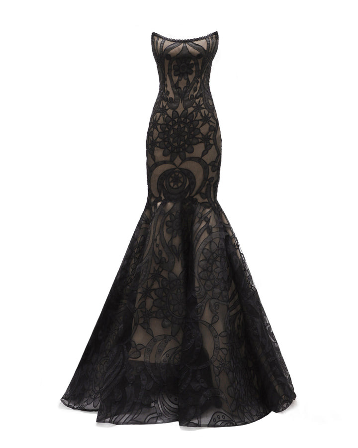 A strapless mermaid-cut lace black evening dress with a flared tail.