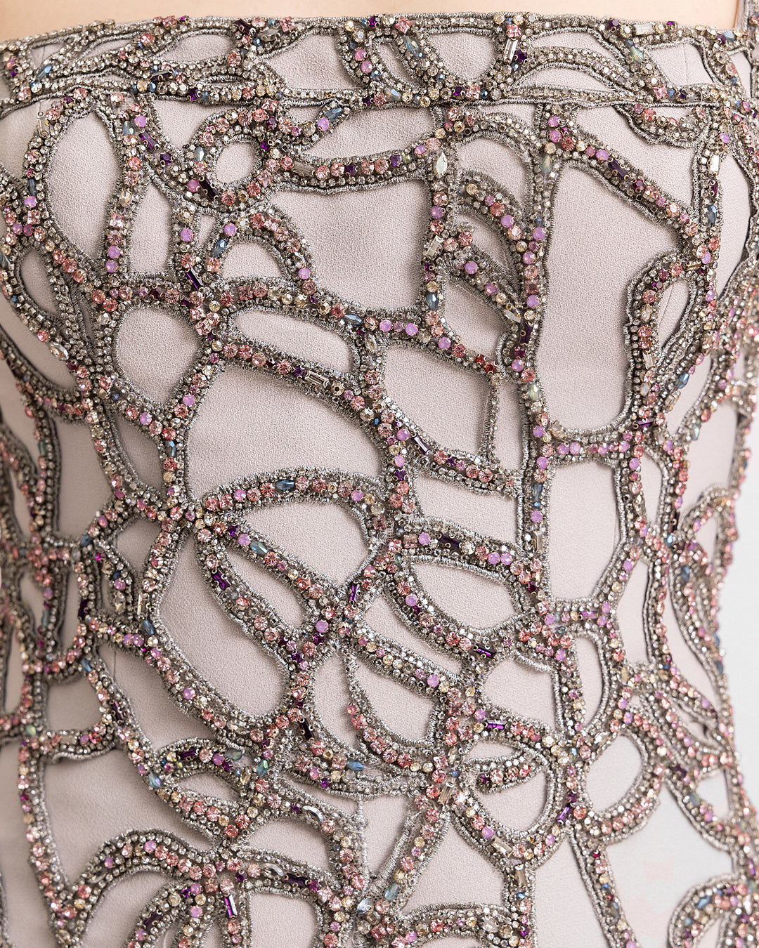 a close-up of a beaded evening dress.