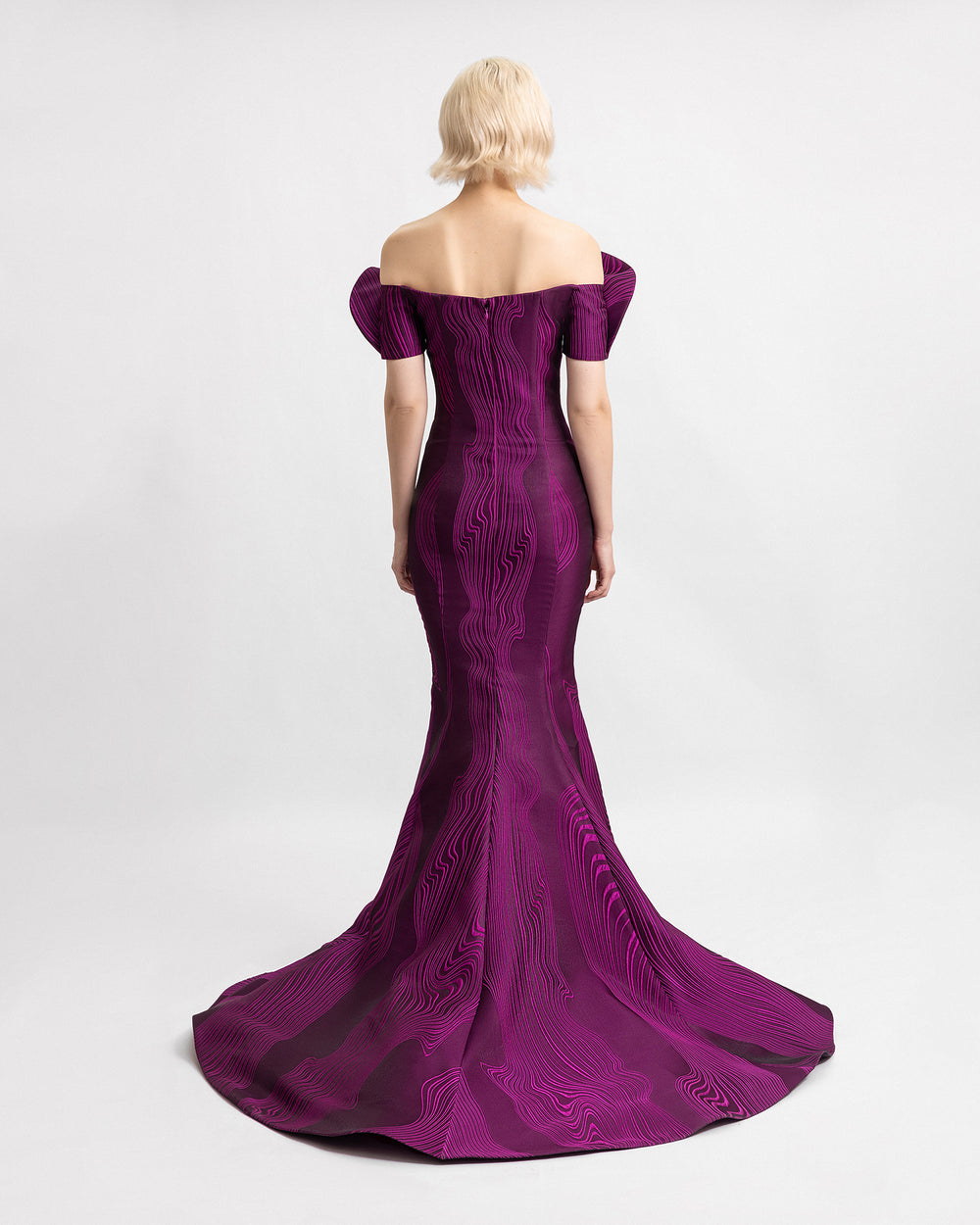 The back of a draped off-the-shoulders slim-cut evening dress in mulberry jacquard fabric.