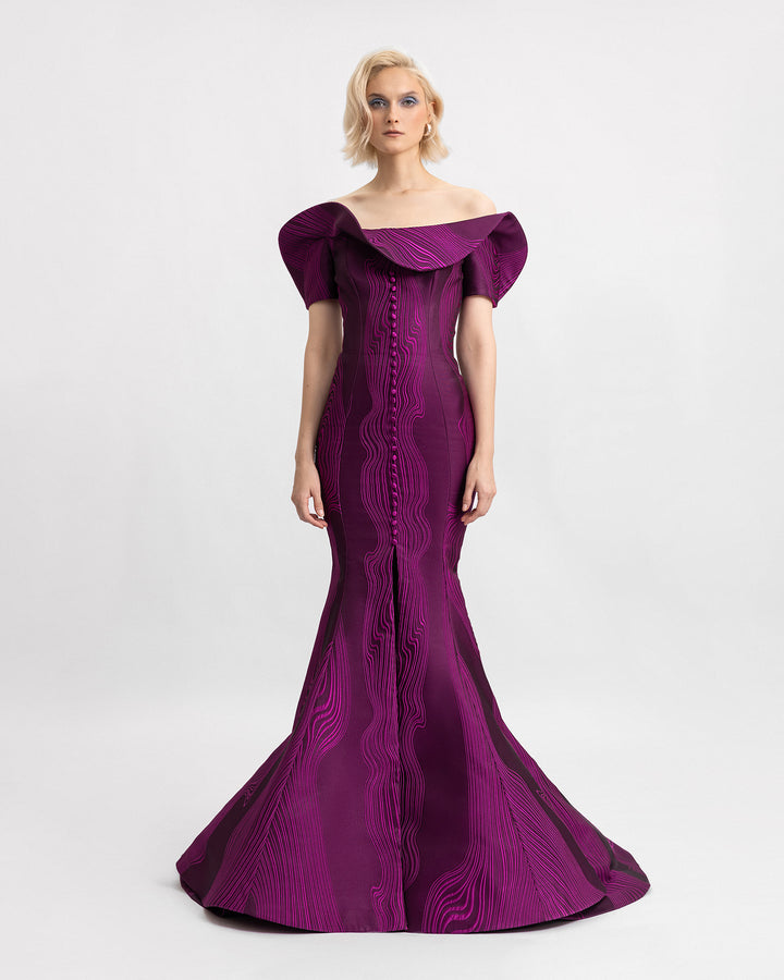 A draped off-the-shoulders slim-cut evening dress in mulberry jacquard fabric with a buttoned down front and a slit in the middle.