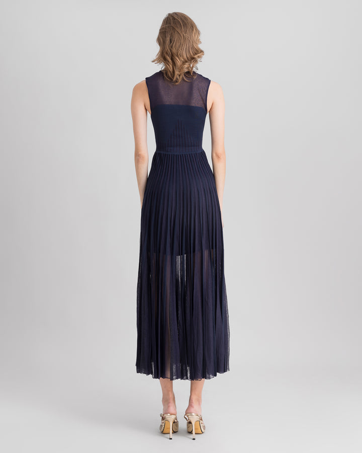 The back of a navy knit midi dress.