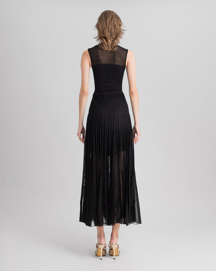 The back a black knit midi dress.