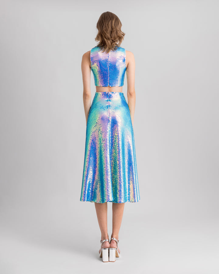 The back of a blue sequined evening wear set featuring a beaded collar cropped-top paired with a midi flared skirt.