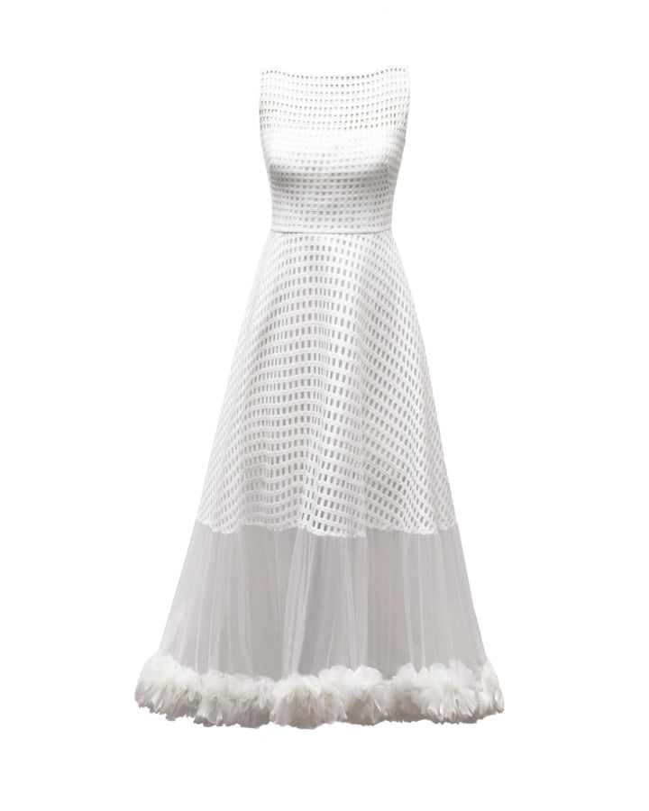 An ivory crochet lace flared midi dress with rushed tulle on the hemline.