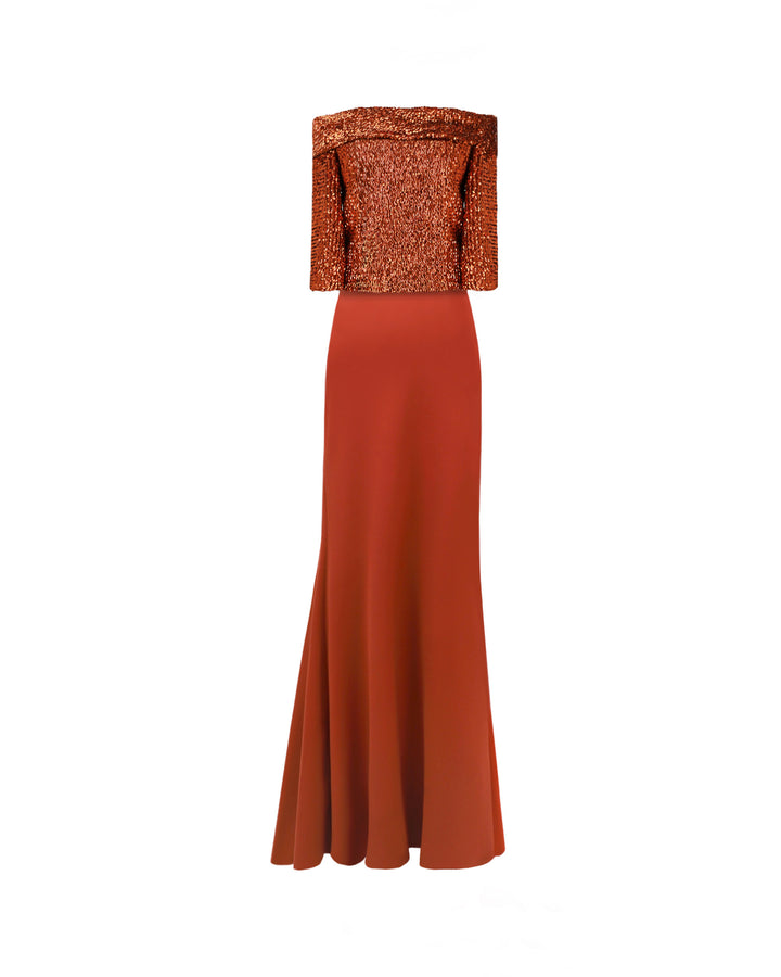 An evening wear set featuring an off-the-shoulders copper sequins top paired with a slim-cut long crepe skirt.