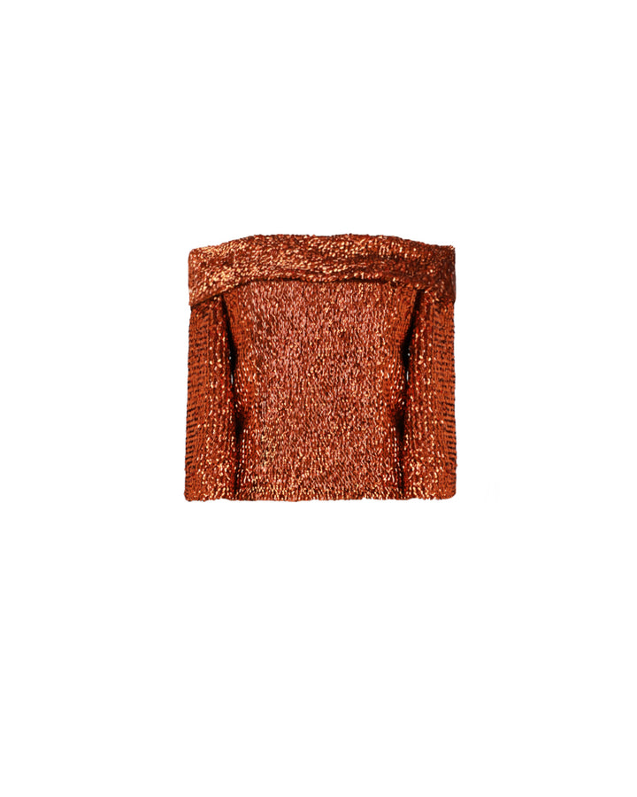 An evening wear set featuring an off-the-shoulders copper sequins top.