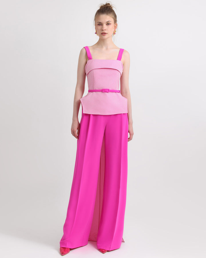 An occasion outfit featuring an asymmetrical crepe top with detachable belt paired with a straight cut fuchsia pants.