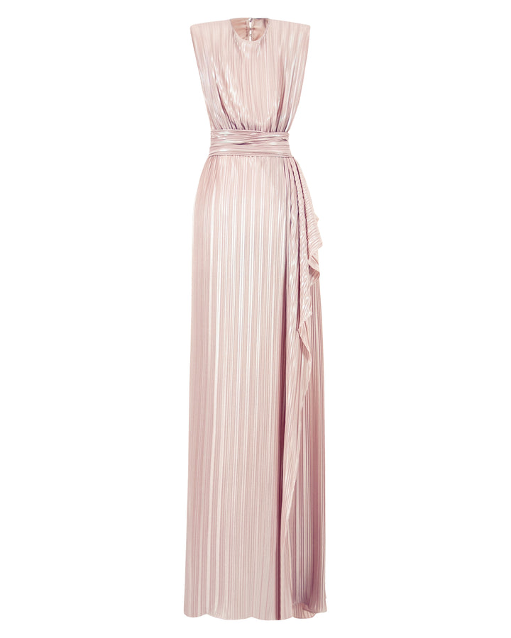 A straight cut blush evening dress with ruffles details and open slit on the side comes in a pleated jersey fabric.