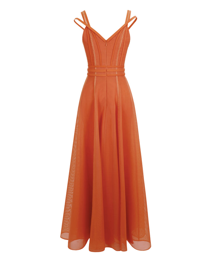 The back of a corset flared mesh orange dress with embroidery details and three stipes belt.