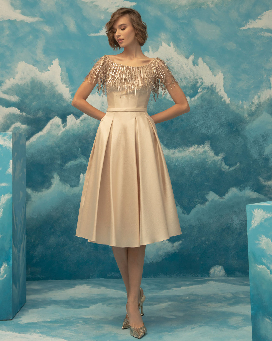 An embellished collar, princess cut midi beige dress in jacquard fabric.