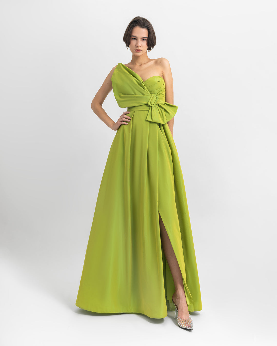 A bow-like design, strapless Tafta green dress with open slit on the side.