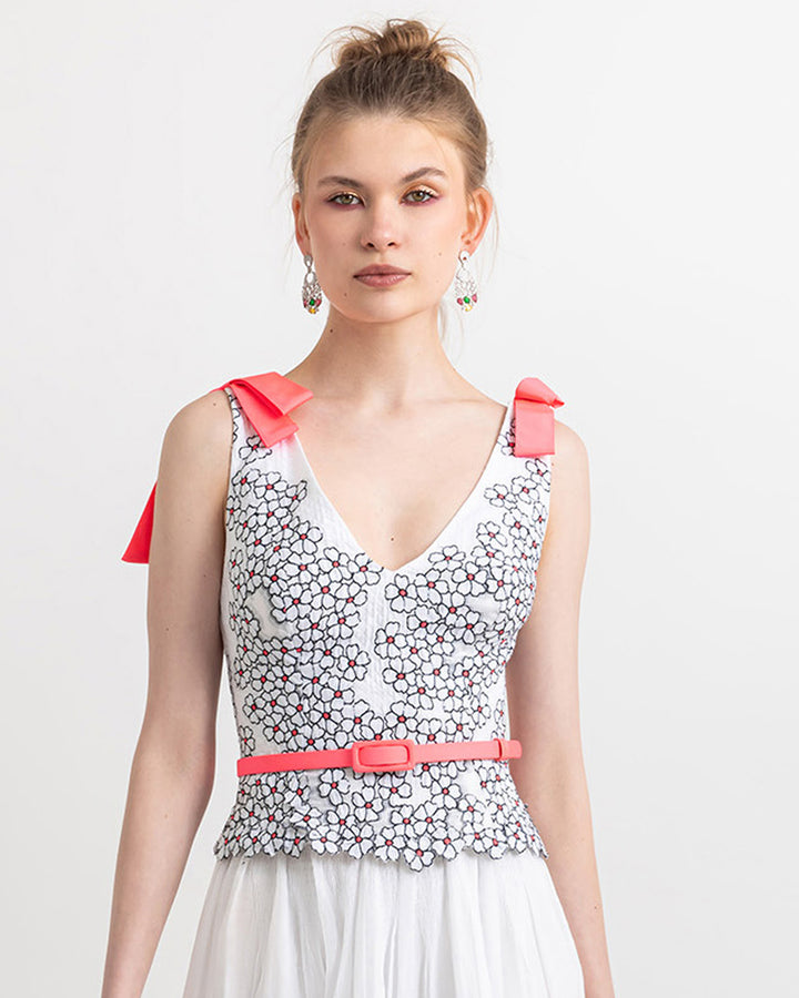 Occasion wear featuring a V-neckline top with pink bow details on the shoulders, and a detachable pink belt.