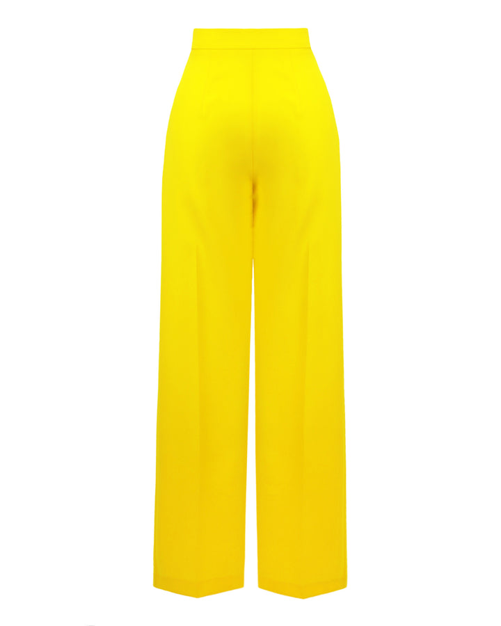 The back of a straight cut yellow crepe pants.