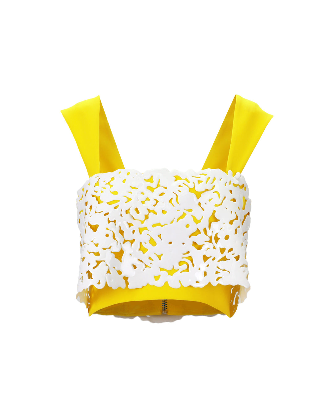 A yellow cropped crepe top with white laser-cut silicon.