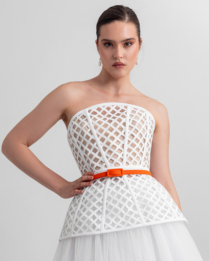 A strapless corset-like top with a detachable orange belt.