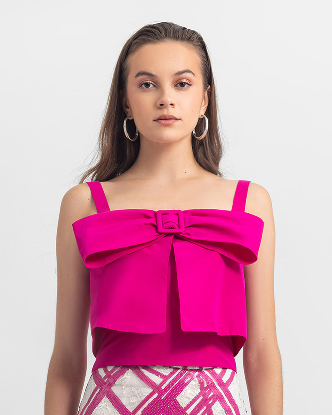 A bow-like design fuchsia taffeta top.